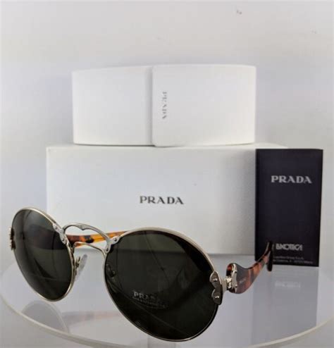 AUTHENTIC Prada Wanderer Round SPR 55T Sunglasses